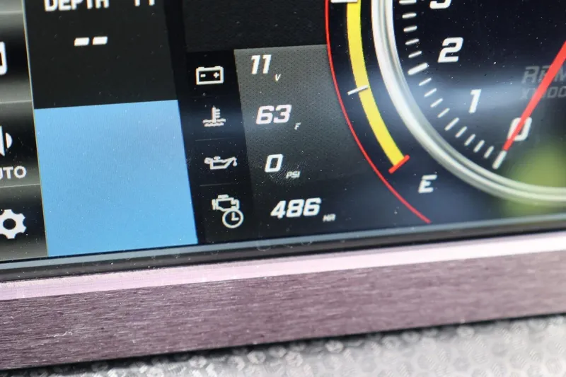 Slide: The Image of Dashboard display of a 2021 Centurion Fi23 boat showing various gauges and indicators. - 49