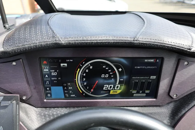 Slide: The Image of Dashboard of a 2021 Centurion Fi23 boat displaying speed and control settings. - 50