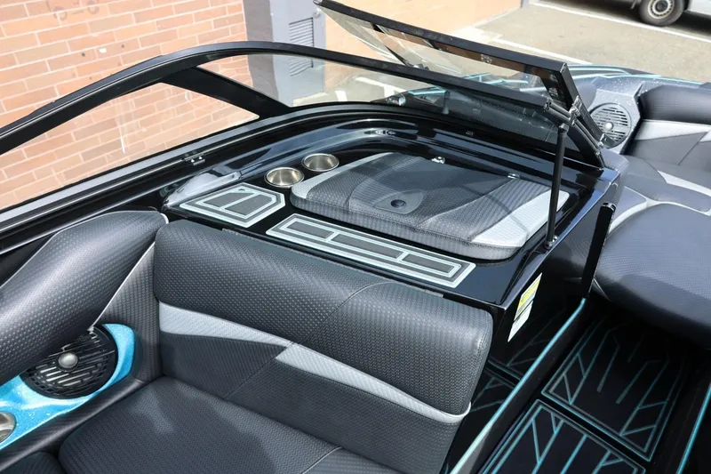 Slide: The Image of Interior of 2021 Centurion Fi23 boat with sleek seating and cup holders. - 51