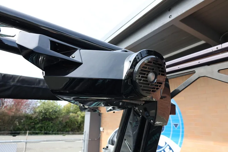 Slide: The Image of 2021 Centurion Fi23 boat speaker system, sleek black design, mounted on a metal frame. - 63