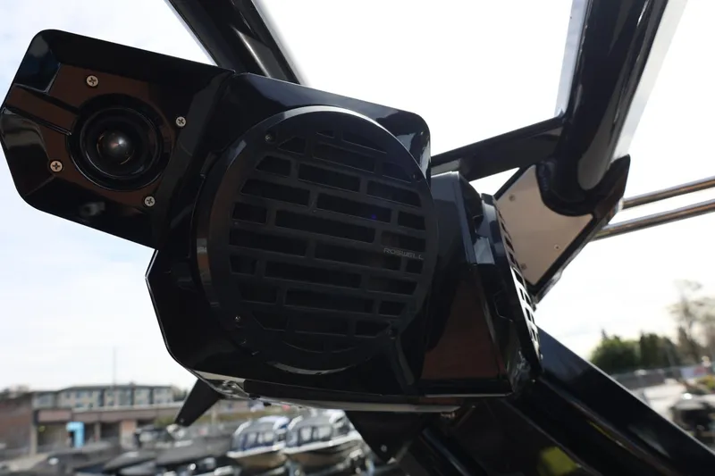 Slide: The Image of Close-up of a 2021 Centurion Fi23 boat speaker system, featuring Roswell audio components. - 65