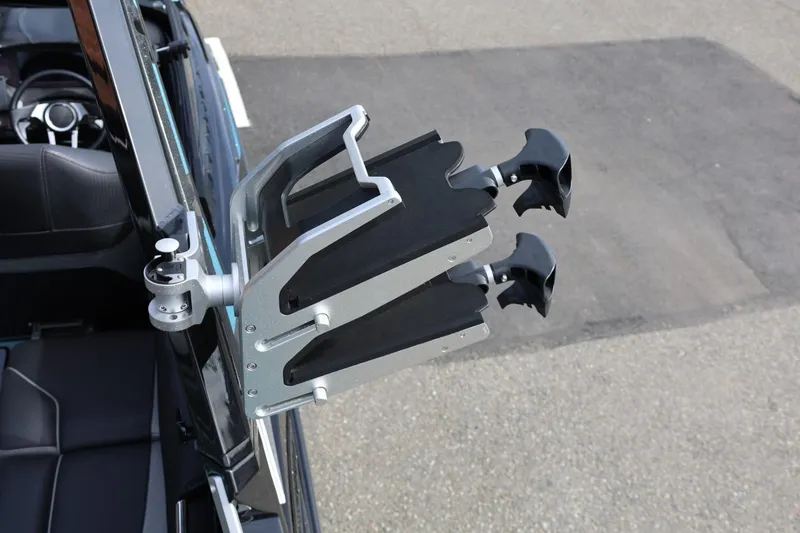 Slide: The Image of Wakeboard rack on 2021 Centurion Fi23 boat, mounted on the side. - 66