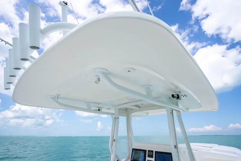 Slide: The Image of 2015 Intrepid 400 Cuddy boat top view against blue sky and ocean. - 21