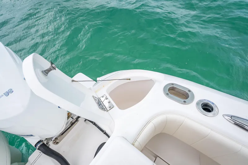 Slide: The Image of 2015 Intrepid 400 Cuddy boat detail with white seating and turquoise water. - 37