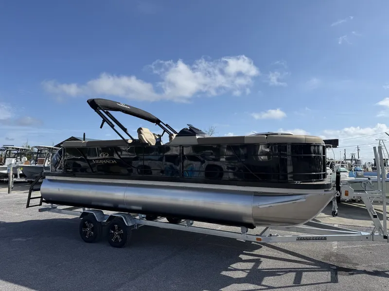 The Image of Veranda Relax Series 175HP-TRITOON 2026 on trailer, blue sky. - 1