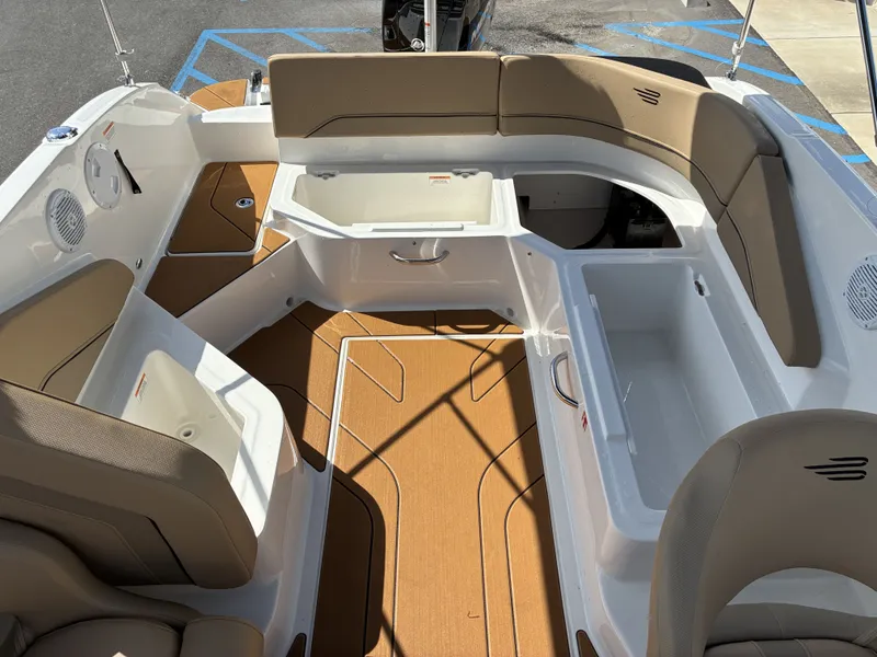 Slide: The Image of Interior of 2026 Bayliner V20 boat with seating and storage compartments. - 14