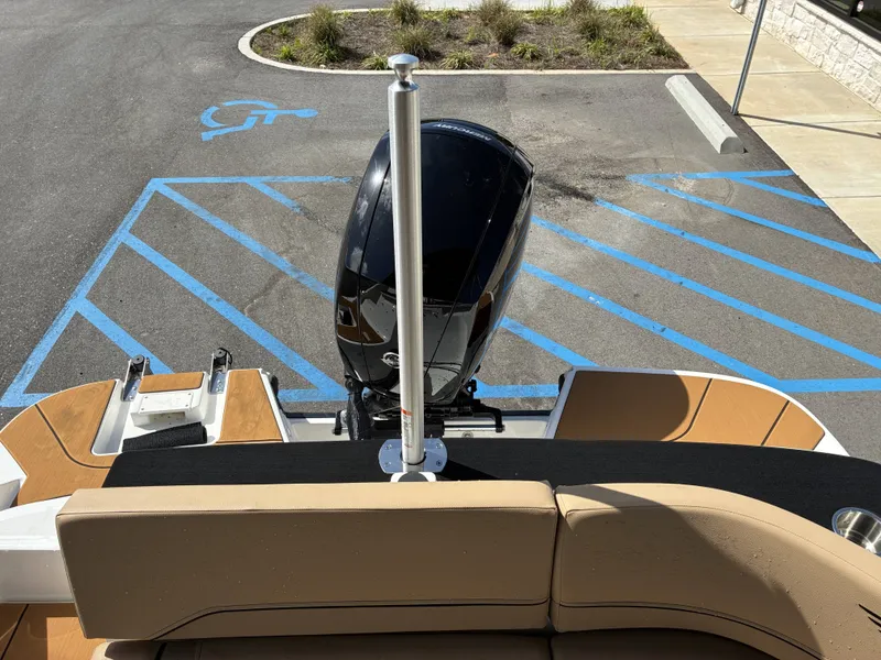 Slide: The Image of Bayliner V20 2026 with outboard motor in parking lot. - 15