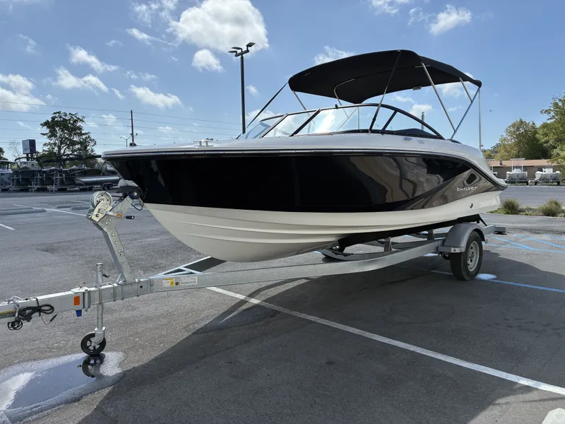 Slide: The Image of 2026 Bayliner V20 boat parked on trailer outdoors. - 6