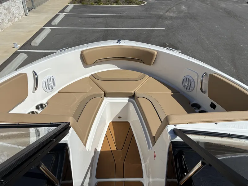 Slide: The Image of Interior view of Bayliner V20 boat, 2026 model, featuring beige upholstery. - 7