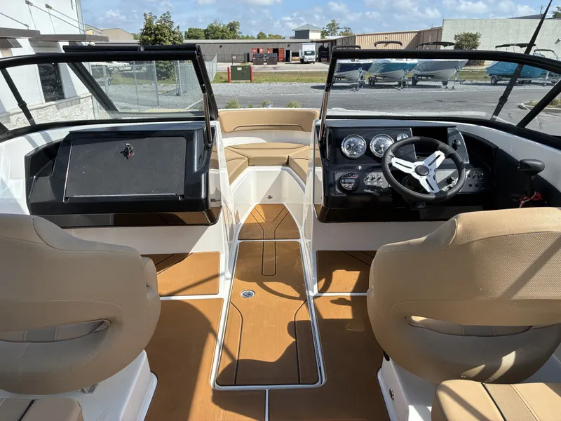 Slide: The Image of Interior of 2026 Bayliner V20 with modern seating and dashboard. - 9
