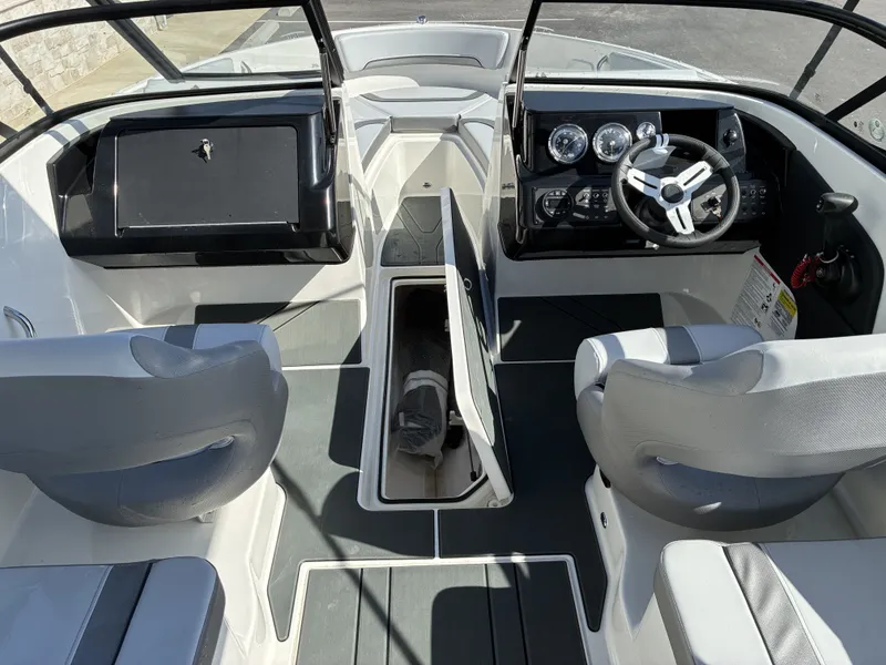 Slide: The Image of Interior of 2026 Bayliner V20 with modern helm console. - 17