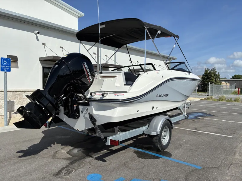 Slide: The Image of 2026 Bayliner V20 boat parked on trailer outdoors. - 3