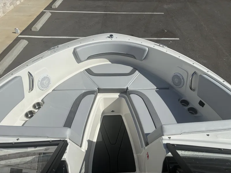 Slide: The Image of Interior view of Bayliner V20 boat, 2026 model, featuring gray upholstery. - 7