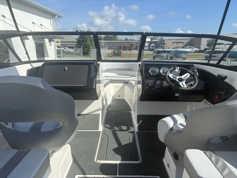Slide: The Image of Interior of Bayliner V20 boat, 2026 model, featuring modern helm console. - 9