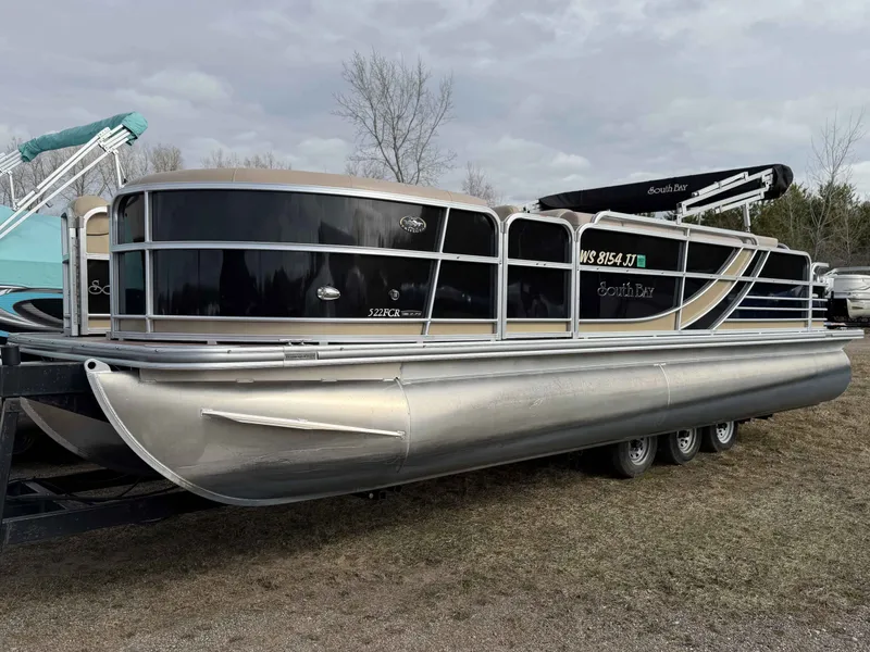 The Image of 2015 South Bay 522 FCR/TT pontoon boat on trailer. - 1