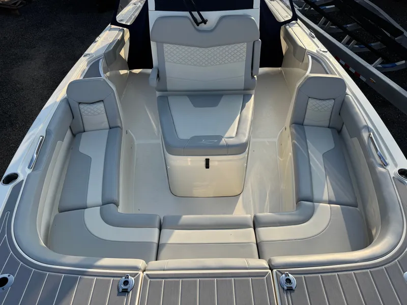 Slide: The Image of Interior of 2024 Scout 281 xss Carbon boat, luxurious seating arrangement. - 11