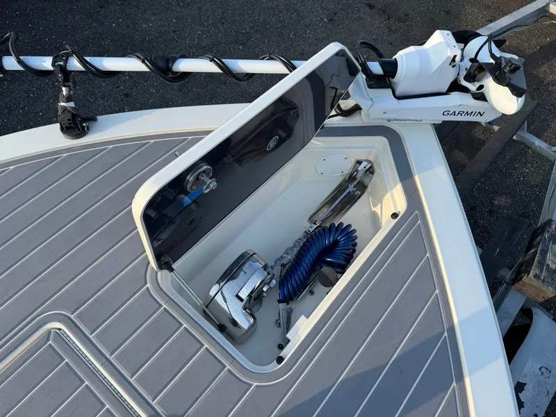 Slide: The Image of 2024 Scout 281 xss Carbon boat with Garmin equipment. - 5