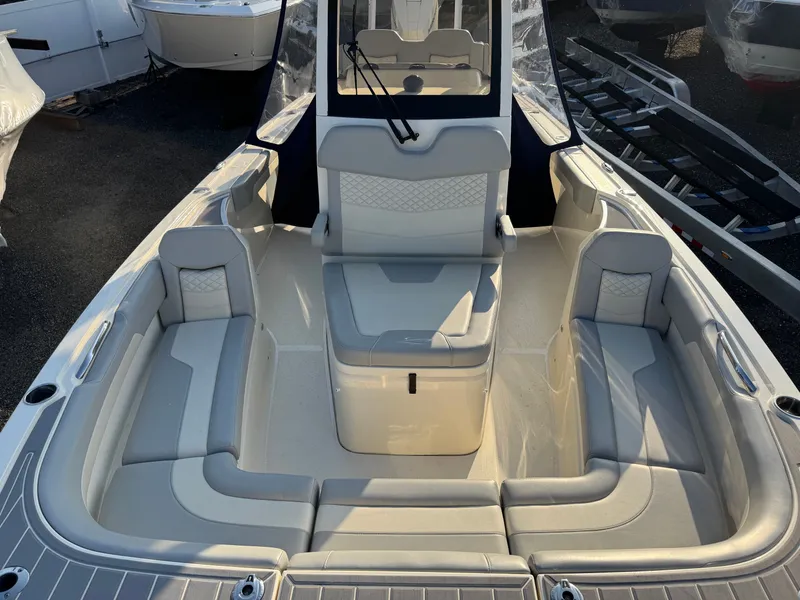 Slide: The Image of Interior of 2024 Scout 281 xss Carbon boat, luxurious seating arrangement. - 6