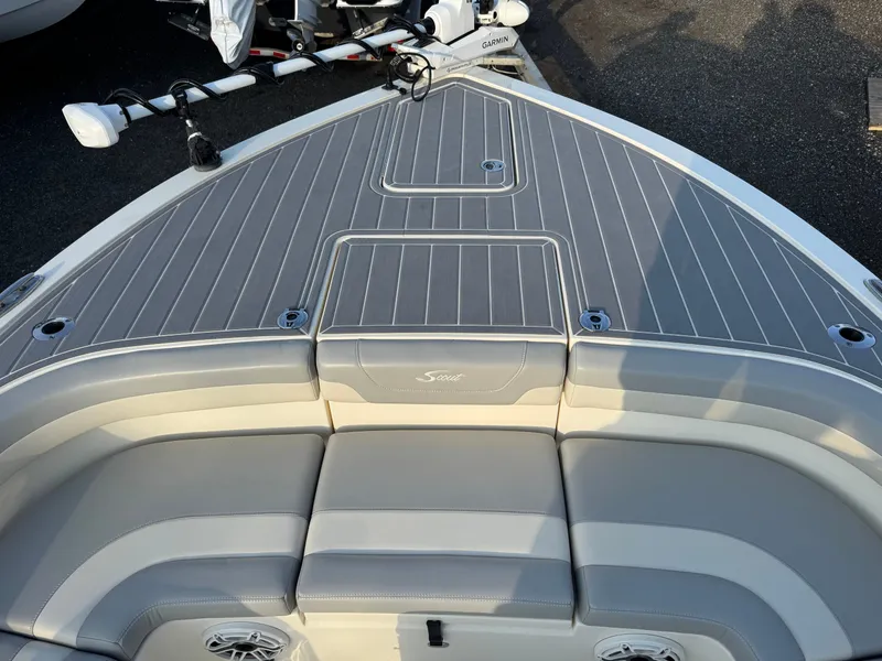 Slide: The Image of 2024 Scout 281 xss Carbon boat with gray deck and seating. - 9