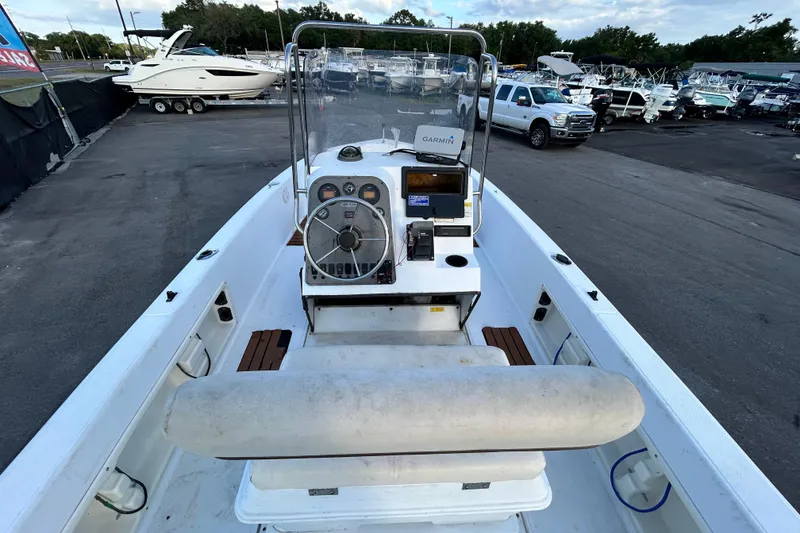 Slide: The Image of 1999 Hydra-Sports 2000 CC boat interior with steering console and Garmin navigation system. - 13