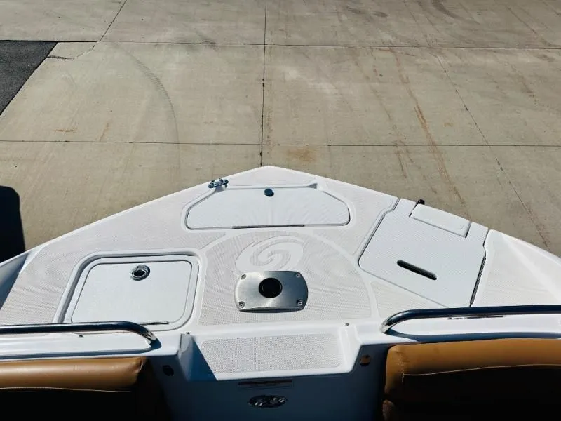 Slide: The Image of Bow of a 2022 Hurricane SD2486 boat on concrete surface. - 12