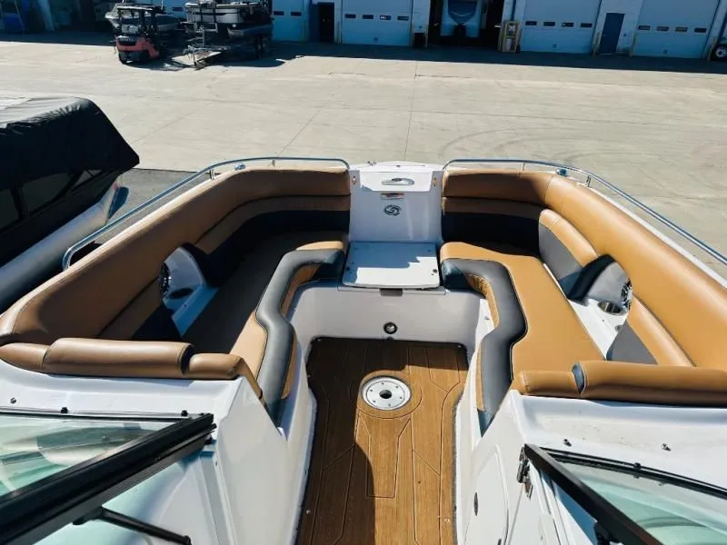 Slide: The Image of Interior of a 2022 Hurricane SD2486 boat with brown seating. - 3