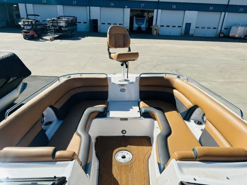 Slide: The Image of Interior of a 2022 Hurricane SD2486 boat with brown seating. - 4