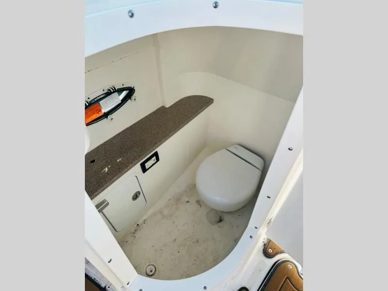 Slide: The Image of Interior of a 2022 Hurricane SD2486 boat toilet. - 5