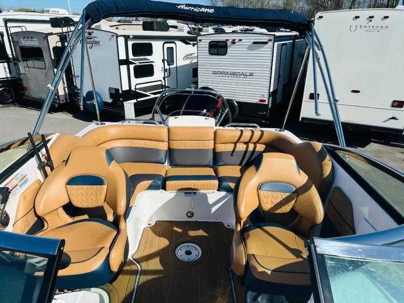Slide: The Image of Interior of a 2022 Hurricane SD2486 boat with luxurious seating. - 6