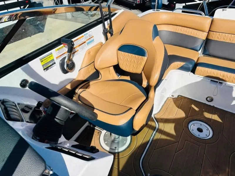 Slide: The Image of Interior of a 2022 Hurricane SD2486 boat with leather seating. - 7