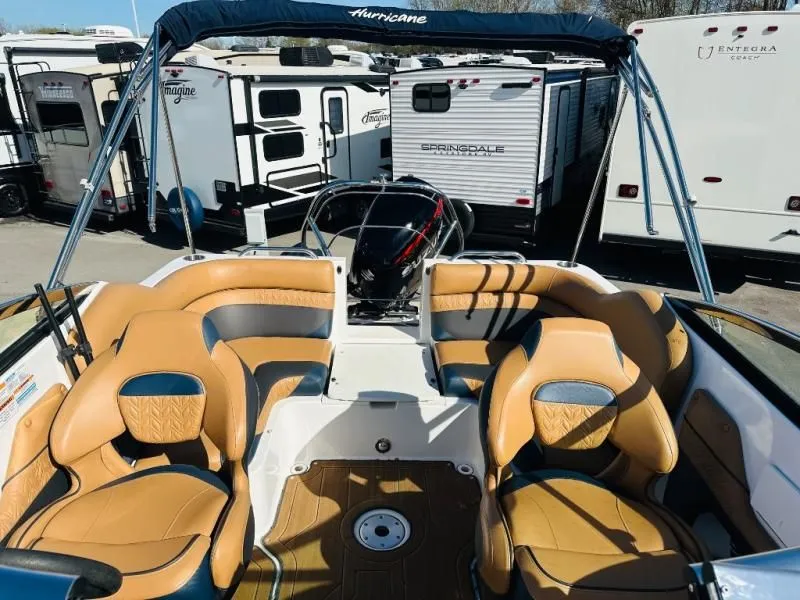 Slide: The Image of Interior of a 2022 Hurricane SD2486 boat with luxurious seating. - 9