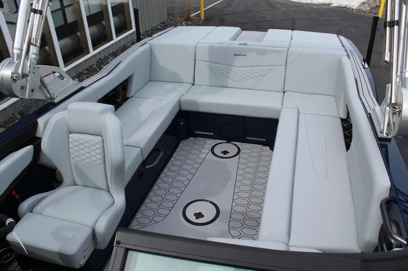 Slide: The Image of Interior of 2026 MasterCraft NXT23 with gray upholstery. - 15