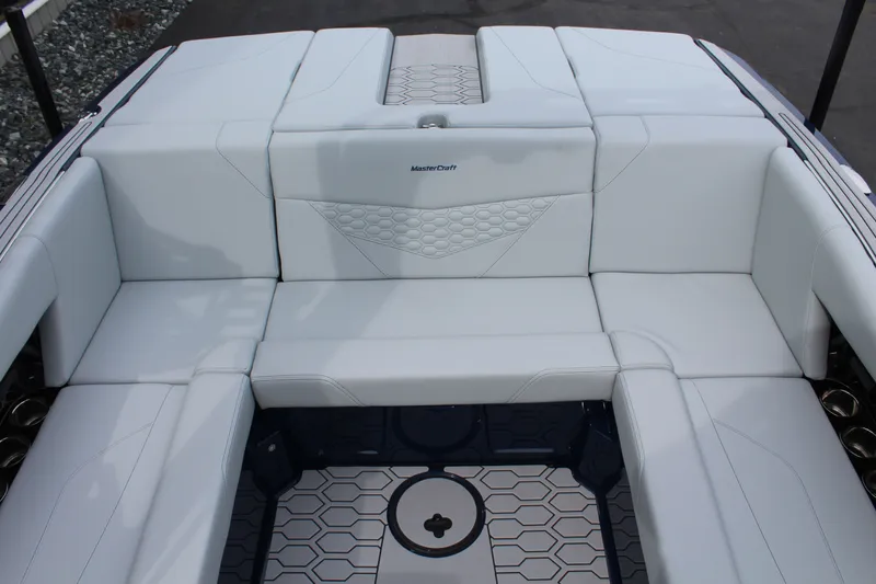 Slide: The Image of Interior of 2026 MasterCraft NXT23 with white upholstery. - 17