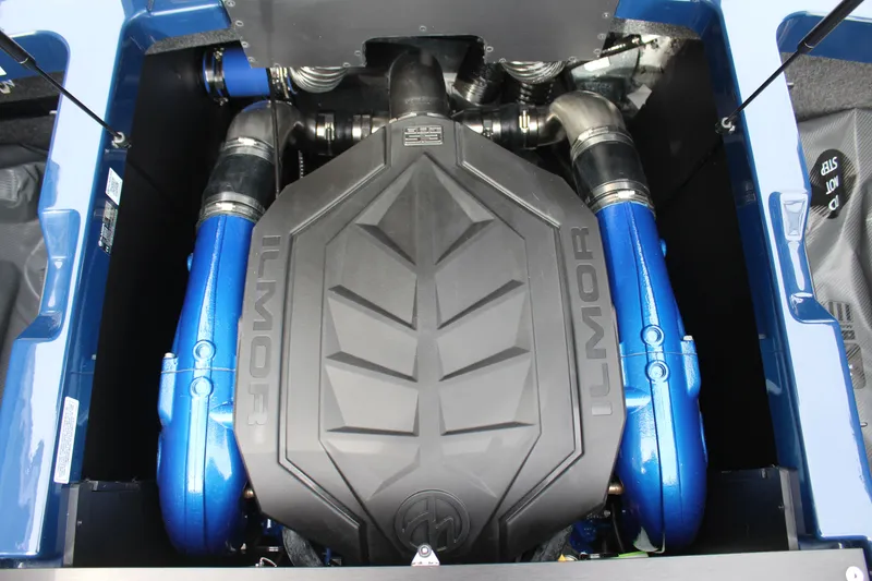 Slide: The Image of 2026 MasterCraft NXT23 engine with Ilmor cover and blue components. - 20