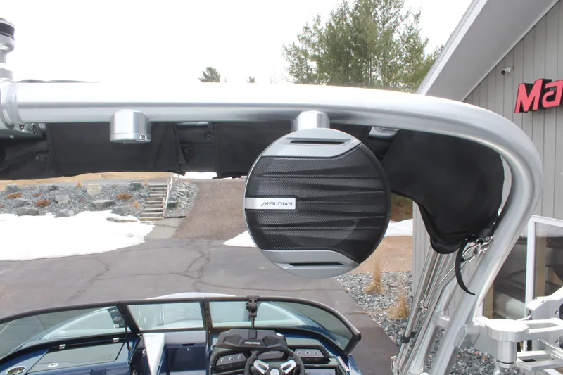 Slide: The Image of 2026 MasterCraft NXT23 with Meridian speaker on boat tower. - 9