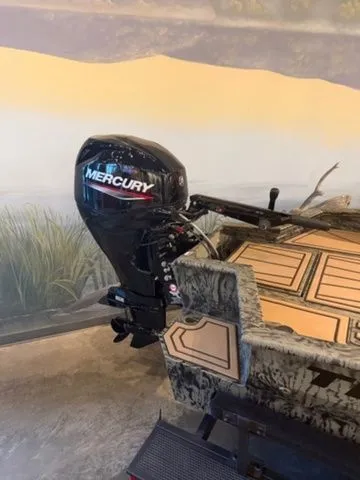 Slide: The Image of Grizzly G1650T DB 2026 boat with Mercury outboard motor. - 11