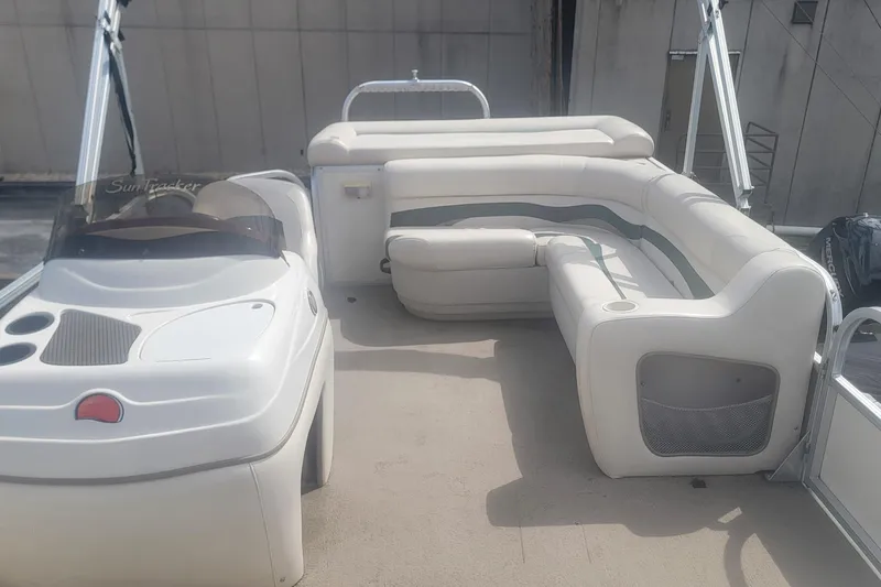 Slide: The Image of 2011 Sun Tracker Party Barge 20 Classic Series with spacious seating and helm. - 9