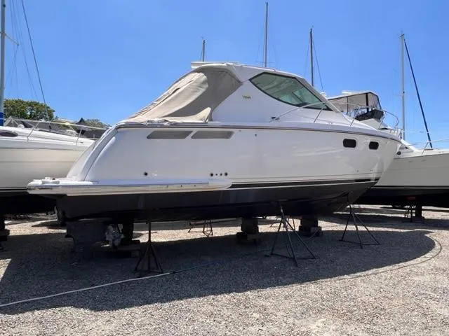 Slide: The Image of 2008 Tiara Yachts 3900 Sovran on stands in a boatyard. - 6