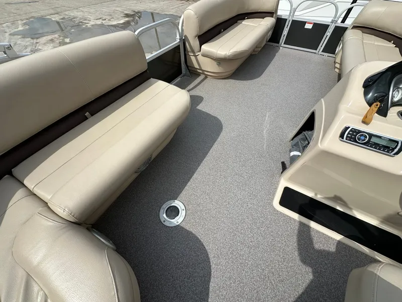 Slide: The Image of Interior of a 2017 Tracker 20 DLX pontoon boat. - 14