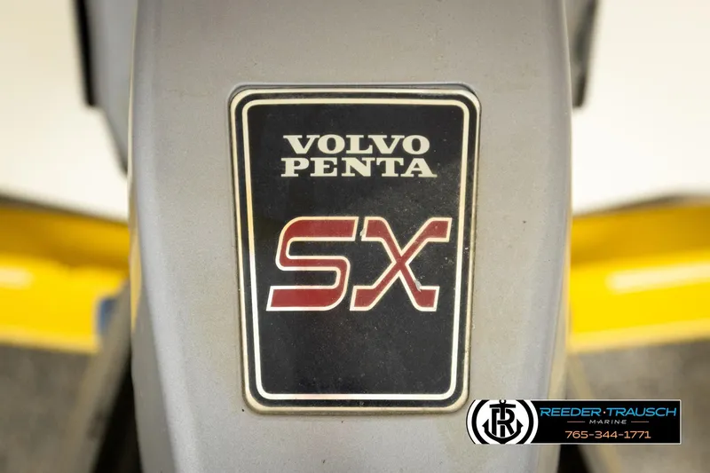 Slide: The Image of Volvo Penta SX logo on 2006 Glastron GX 235 boat engine. - 45