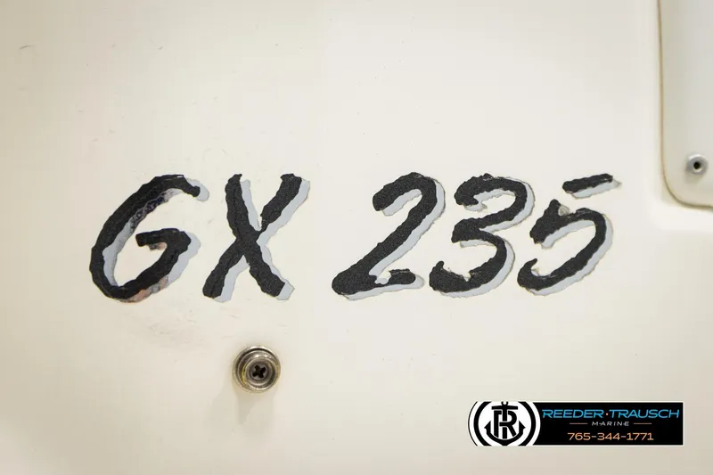 Slide: The Image of Close-up of 2006 Glastron GX 235 model lettering on boat hull. - 49