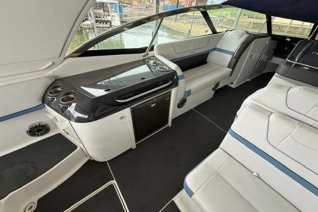 Slide: The Image of 2023 Formula 350 Crossover Bowrider I/O interior with sleek seating and modern amenities. - 10