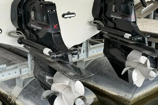 Slide: The Image of 2023 Formula 350 Crossover Bowrider I/O with MerCruiser engines in dock. - 4