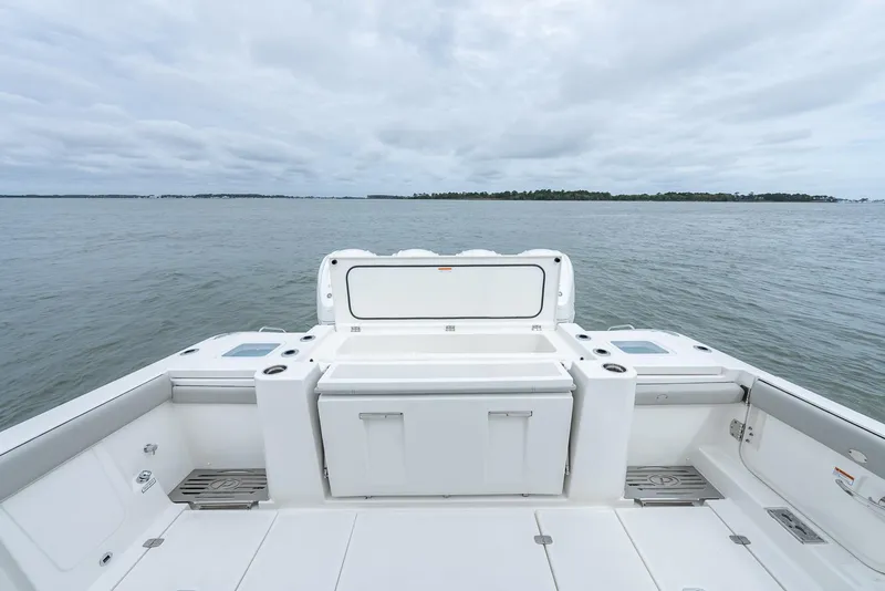 Slide: The Image of 2023 Pursuit S 428 Sport boat deck with ocean view. - 25