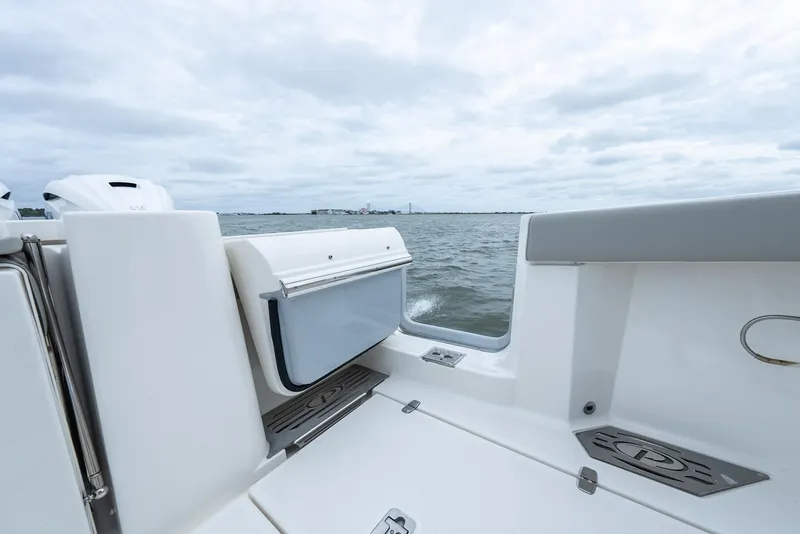 Slide: The Image of 2023 Pursuit S 428 Sport boat interior with ocean view. - 31