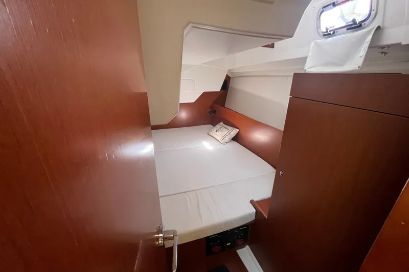 Slide: The Image of Cozy cabin interior of 2016 Beneteau Oceanis 38.1 sailboat with wooden finish. - 18