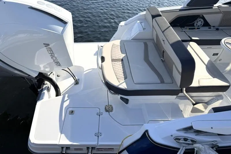 Slide: The Image of 2022 Monterey 255SS Super Sport boat with Mercury engine, featuring sleek seating and modern design. - 11