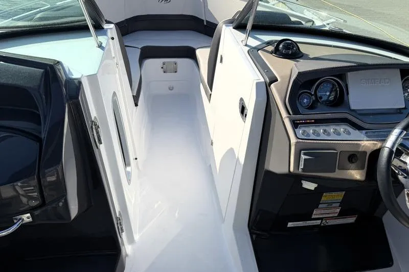Slide: The Image of 2022 Monterey 255SS Super Sport boat interior with sleek dashboard and seating area. - 15