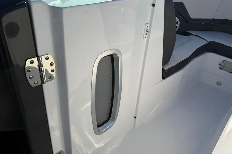 Slide: The Image of Interior view of 2022 Monterey 255SS Super Sport boat, featuring sleek seating and modern design. - 17