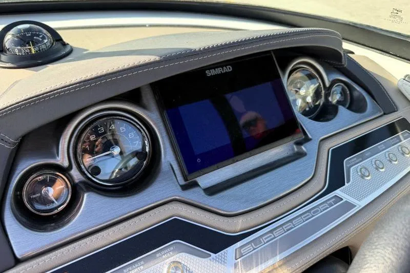 Slide: The Image of Dashboard of 2022 Monterey 255SS Super Sport boat with Simrad display and gauges. - 24